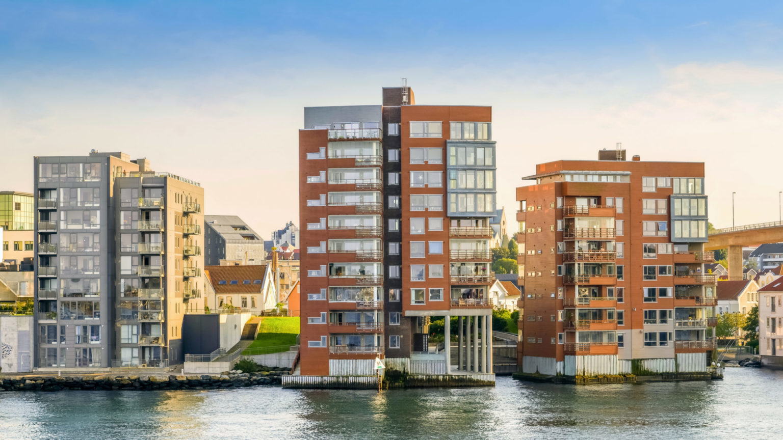 A seafront district of Stavanger in southern Norway with some modern and energy efficient residential buildings. Featuring a modern construction using sustainable materials, these residential buildings maintain a Scandinavian design in harmony with the surrounding space. The city of Stavanger is among the favorite tourist destinations for thousands of tourists who arrive with the numerous cruise ships that ply the routes of northern Europe and the Norwegian coast. Stavanger is also known for being the oil city of Norway, with the presence of many national and multinational energy companies and a museum completely dedicated to oil and its extraction. Image in 16:9 and High Definition format.